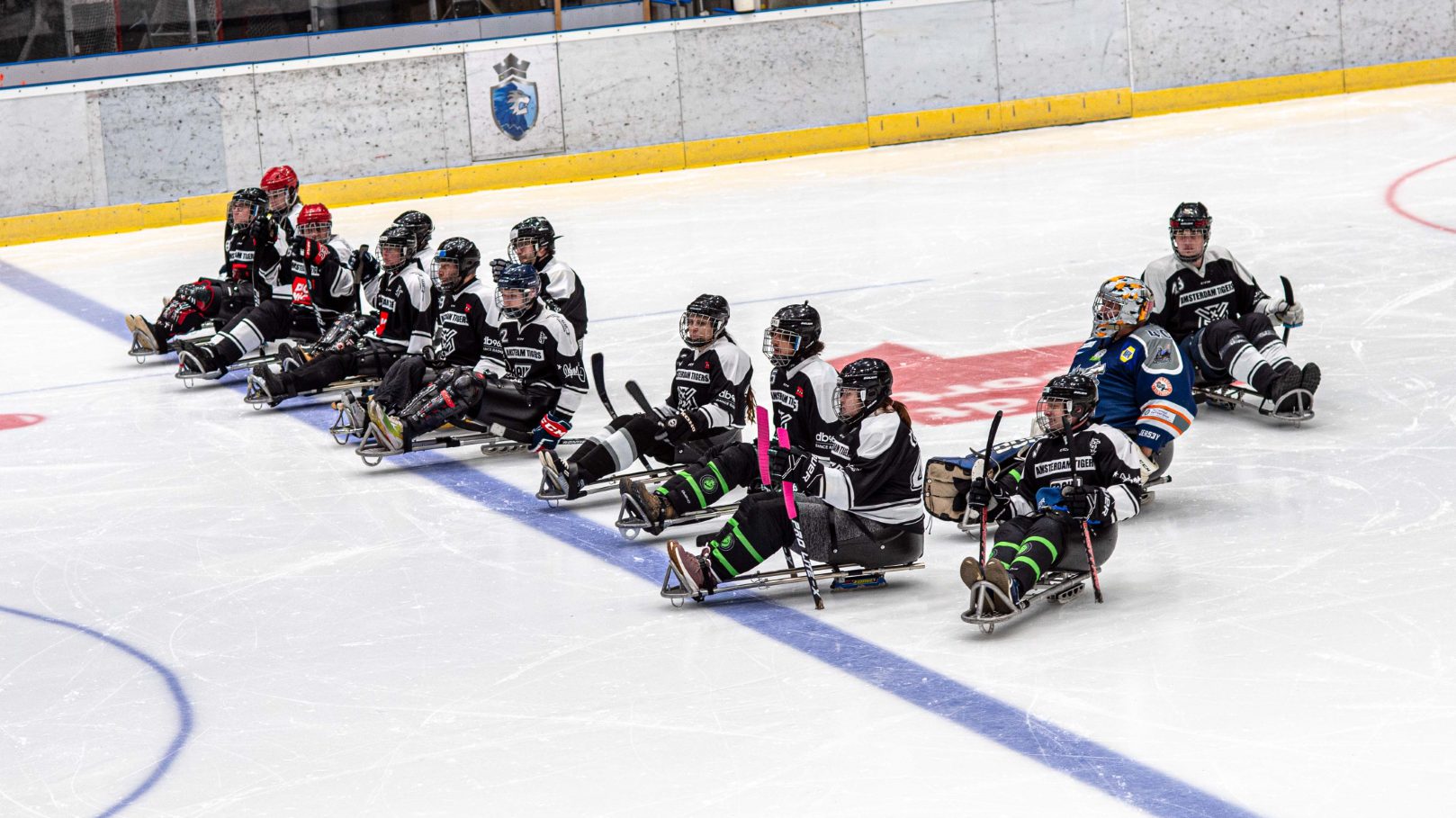 teamwork en strategie oefening voor para ijshockey
